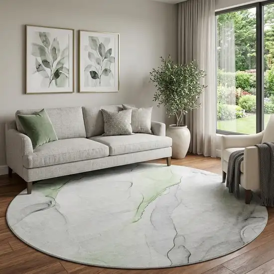8' Green And Ivory Abstract Washable Round Rug With UV Protection Photo 1