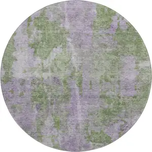Photo of 8' Green And Ivory Abstract Washable Round Rug With UV Protection