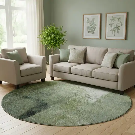 8' Green And Ivory Abstract Washable Round Rug With UV Protection Photo 1