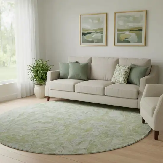 8' Green And Ivory Abstract Washable Round Rug With UV Protection Photo 1