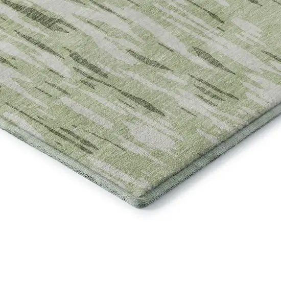 8' Green And Ivory Abstract Washable Round Rug With UV Protection Photo 6