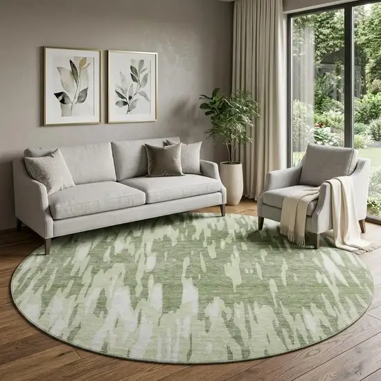 8' Green And Ivory Abstract Washable Round Rug With UV Protection Photo 1