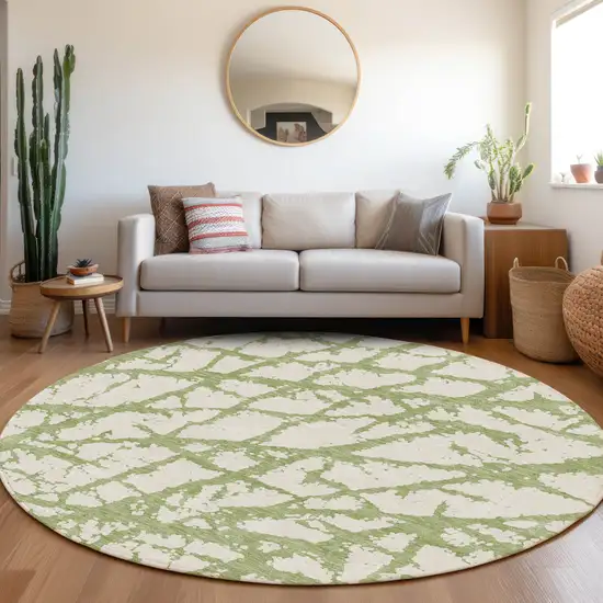 8' Green And Ivory Abstract Washable Round Rug With UV Protection Photo 4