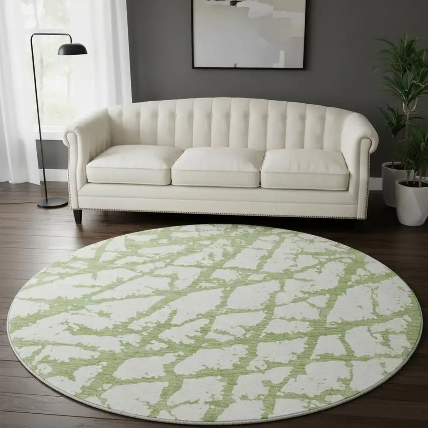 8' Green And Ivory Abstract Washable Round Rug With UV Protection Photo 2