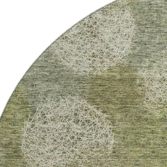 8' Green And Ivory Abstract Washable Round Rug With UV Protection Photo 2