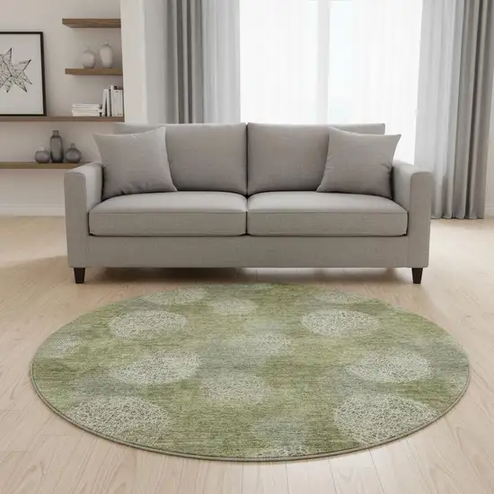 8' Green And Ivory Abstract Washable Round Rug With UV Protection Photo 2