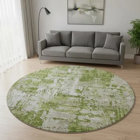 8' Green And Ivory Abstract Washable Round Rug With UV Protection Photo 2
