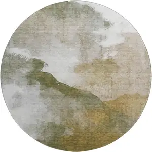 Photo of 8' Green And Ivory Abstract Washable Round Rug With UV Protection