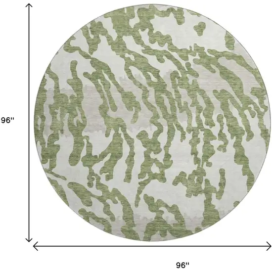 8' Green And Ivory Animal Print Washable Round Rug With UV Protection Photo 9