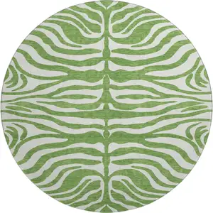 Photo of 8' Green And Ivory Animal Print Washable Round Rug With UV Protection