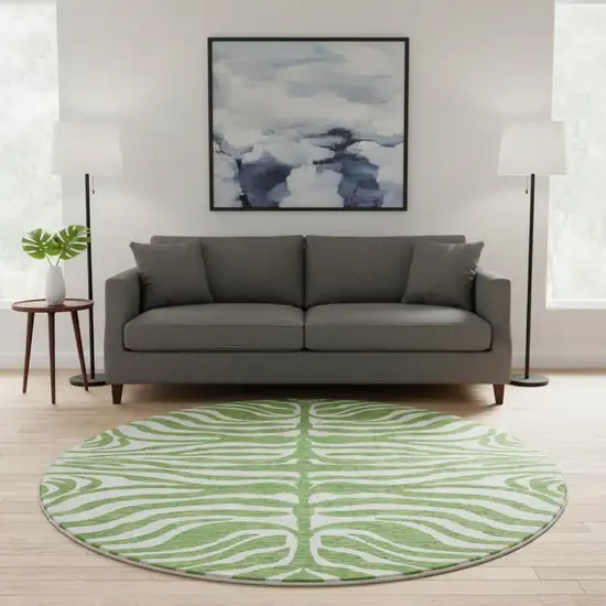 8' Green And Ivory Animal Print Washable Round Rug With UV Protection Photo 2