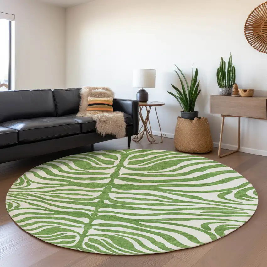 8' Green And Ivory Animal Print Washable Round Rug With UV Protection Photo 4