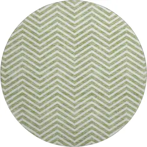 Photo of 8' Green And Ivory Chevron Washable Round Rug With UV Protection