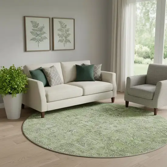 8' Green And Ivory Floral Washable Round Rug With UV Protection Photo 1