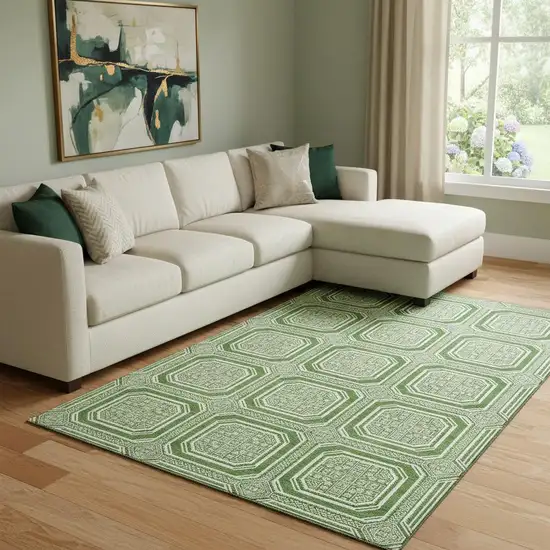 8' Green And Ivory Geometric Washable Area Rug With UV Protection Photo 2