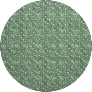 Photo of 8' Green And Ivory Geometric Washable Round Rug With UV Protection