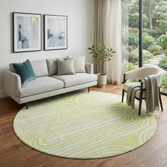 8' Green And Ivory Geometric Distressed Washable Round Rug With UV Protection Photo 1