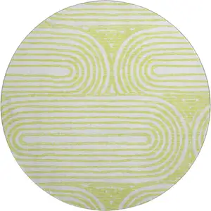 Photo of 8' Green And Ivory Geometric Washable Round Rug With UV Protection