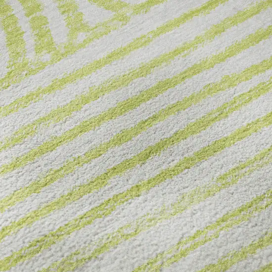 8' Green And Ivory Geometric Washable Round Rug With UV Protection Photo 9