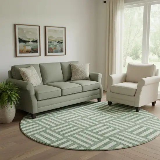 8' Green And Ivory Geometric Washable Round Rug With UV Protection Photo 1