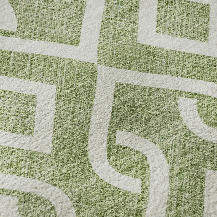 8' Green And Ivory Geometric Washable Round Rug With UV Protection Photo 9