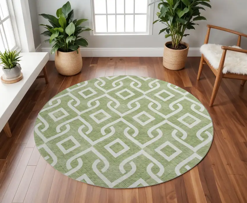 8' Green And Ivory Geometric Washable Round Rug With UV Protection Photo 2