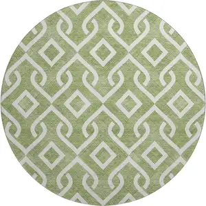 Photo of 8' Green And Ivory Geometric Washable Round Rug With UV Protection