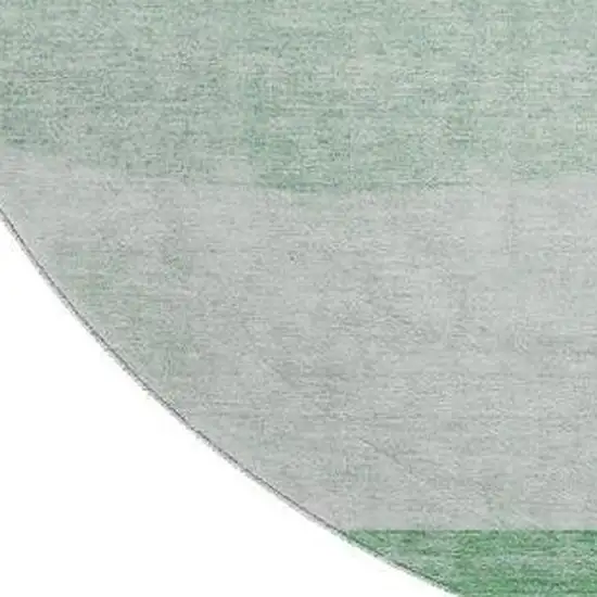 8' Green And Ivory Geometric Washable Round Rug With UV Protection Photo 3