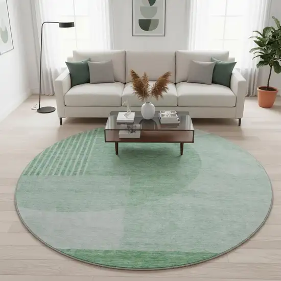 8' Green And Ivory Geometric Washable Round Rug With UV Protection Photo 2