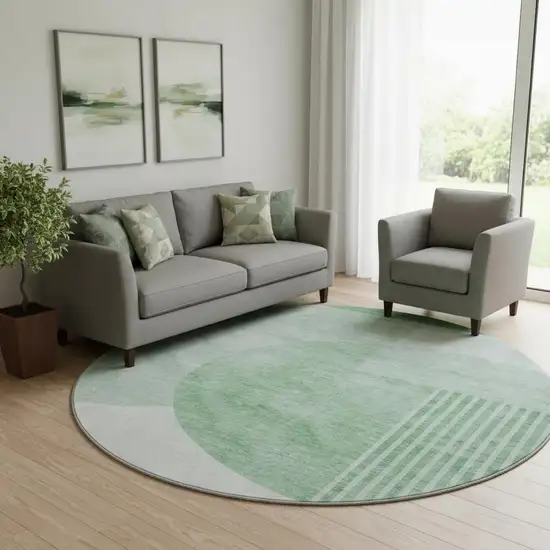 8' Green And Ivory Geometric Washable Round Rug With UV Protection Photo 1