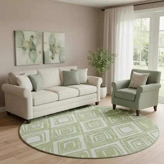 8' Green And Ivory Geometric Washable Round Rug With UV Protection Photo 1