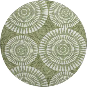 Photo of 8' Green And Ivory Geometric Washable Round Rug With UV Protection