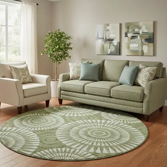 8' Green And Ivory Geometric Washable Round Rug With UV Protection Photo 1