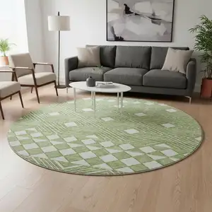 Photo of 8' Green And Ivory Geometric Washable Round Rug With UV Protection