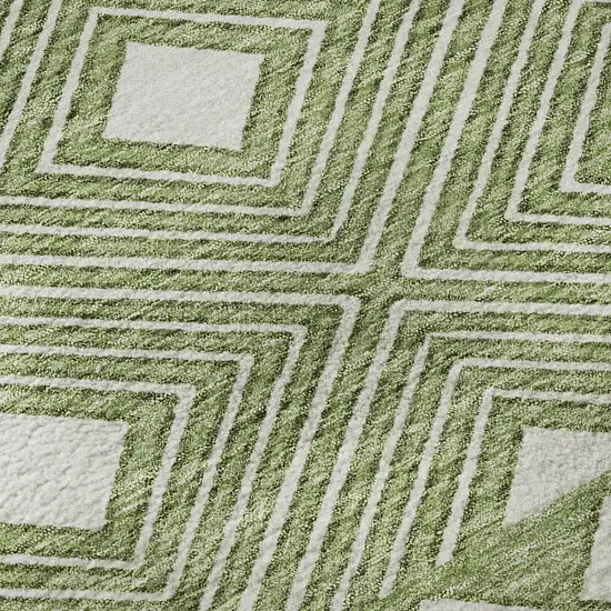 8' Green And Ivory Geometric Washable Round Rug With UV Protection Photo 9