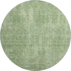 Photo of 8' Green And Ivory Geometric Washable Round Rug With UV Protection