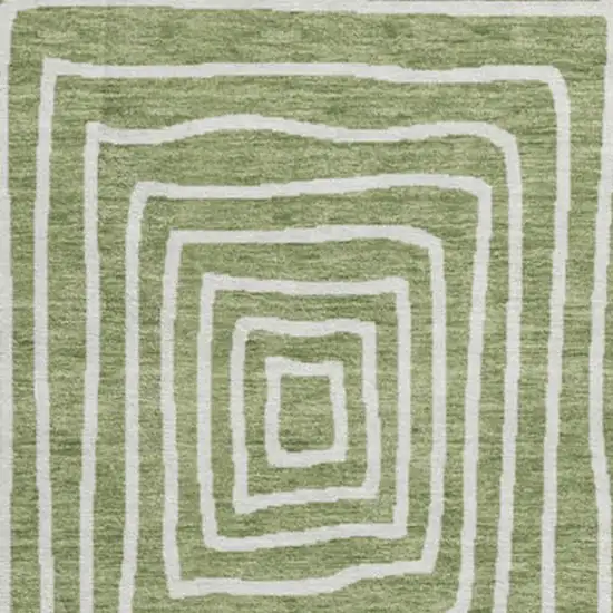 8' Green And Ivory Geometric Washable Round Rug With UV Protection Photo 3