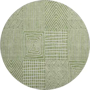 Photo of 8' Green And Ivory Geometric Washable Round Rug With UV Protection