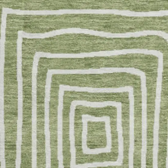 8' Green And Ivory Geometric Washable Round Rug With UV Protection Photo 2