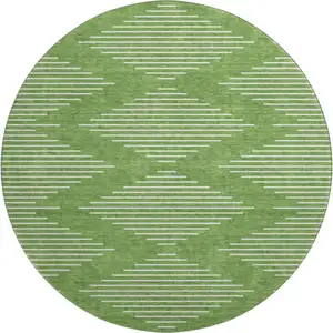 Photo of 8' Green And Ivory Geometric Washable Round Rug With UV Protection