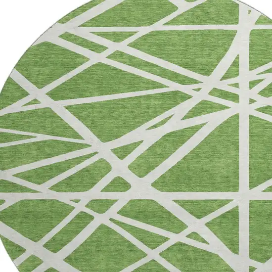 8' Green And Ivory Geometric Washable Round Rug With UV Protection Photo 2