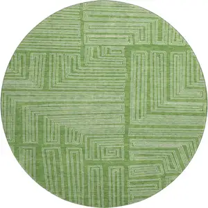 Photo of 8' Green And Ivory Geometric Washable Round Rug With UV Protection