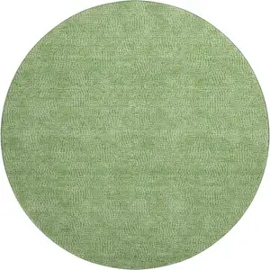 Photo of 8' Green And Ivory Geometric Washable Round Rug With UV Protection