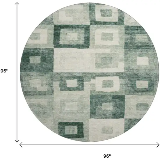 8' Green And Ivory Geometric Washable Round Rug With UV Protection Photo 9