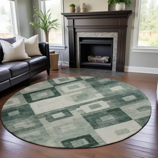 8' Green And Ivory Geometric Washable Round Rug With UV Protection Photo 4