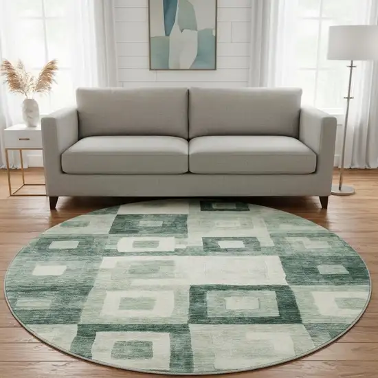 8' Green And Ivory Geometric Washable Round Rug With UV Protection Photo 2
