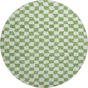 Photo of 8' Green And Ivory Geometric Washable Round Rug With UV Protection