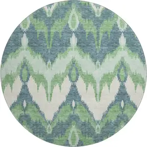 Photo of 8' Green And Ivory Ikat Washable Round Rug With UV Protection