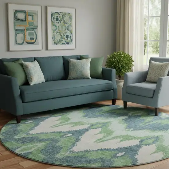 8' Green And Ivory Ikat Washable Round Rug With UV Protection Photo 1