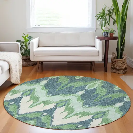 8' Green And Ivory Ikat Washable Round Rug With UV Protection Photo 5